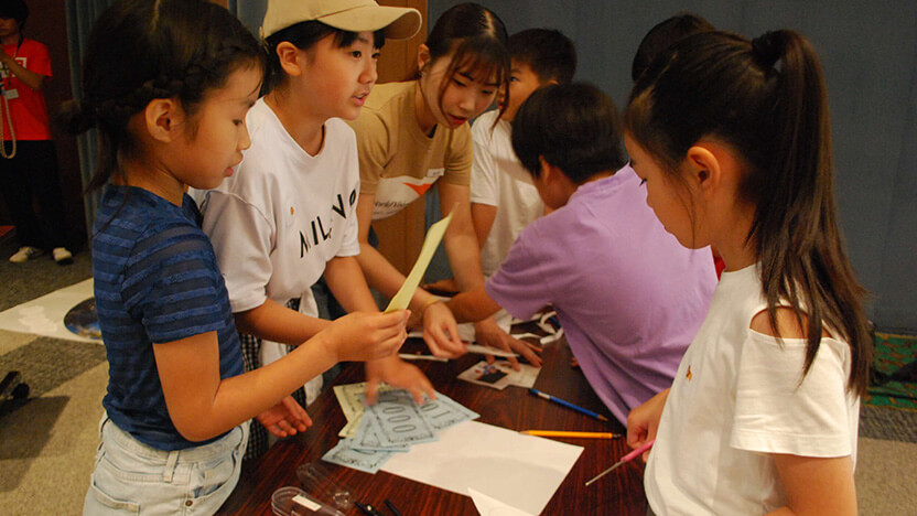 「豊かな国をつくるには、どうしたらいいかな」国づくりを通して不公正や開発について「新・貿易ゲーム」を通して考えました